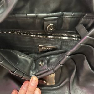 Prada shoulder bag with broken clasp